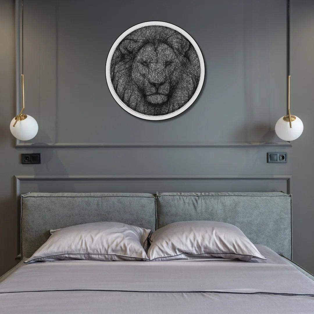 Finished string art design of a lion from the Black Collection with indoor background, using white board and black strings