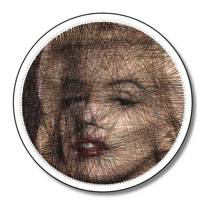 Finished string art design of Marilyn Monroe from the Color Collection, using white board and color strings