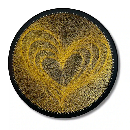 Finished string art design of the word "Love" from the Gold Collection using black board and gold strings